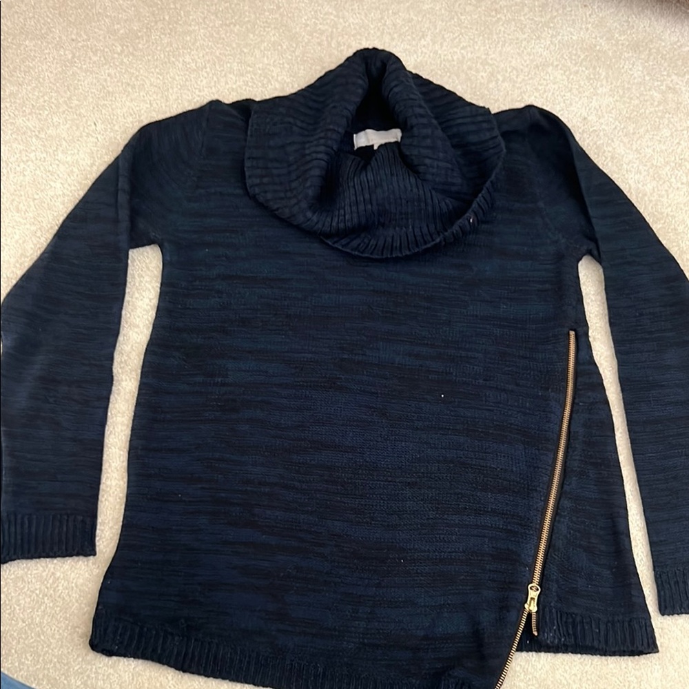 Beautiful Sweater with great details.